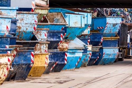 Camden Skip Hire truck and crew sorting waste on site in Camden